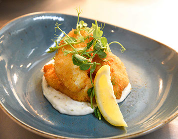 Enjoy Scampi and Fish at Sea Breezes Seafood restaurant